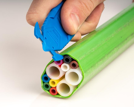 Tool for cutting and removing the microtube cover