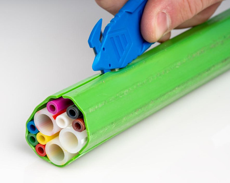 Tool for cutting and removing the microtube cover